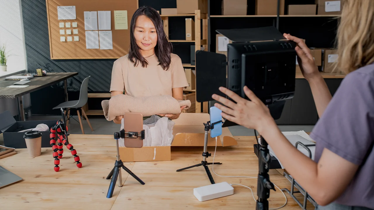 woman recording product review in office